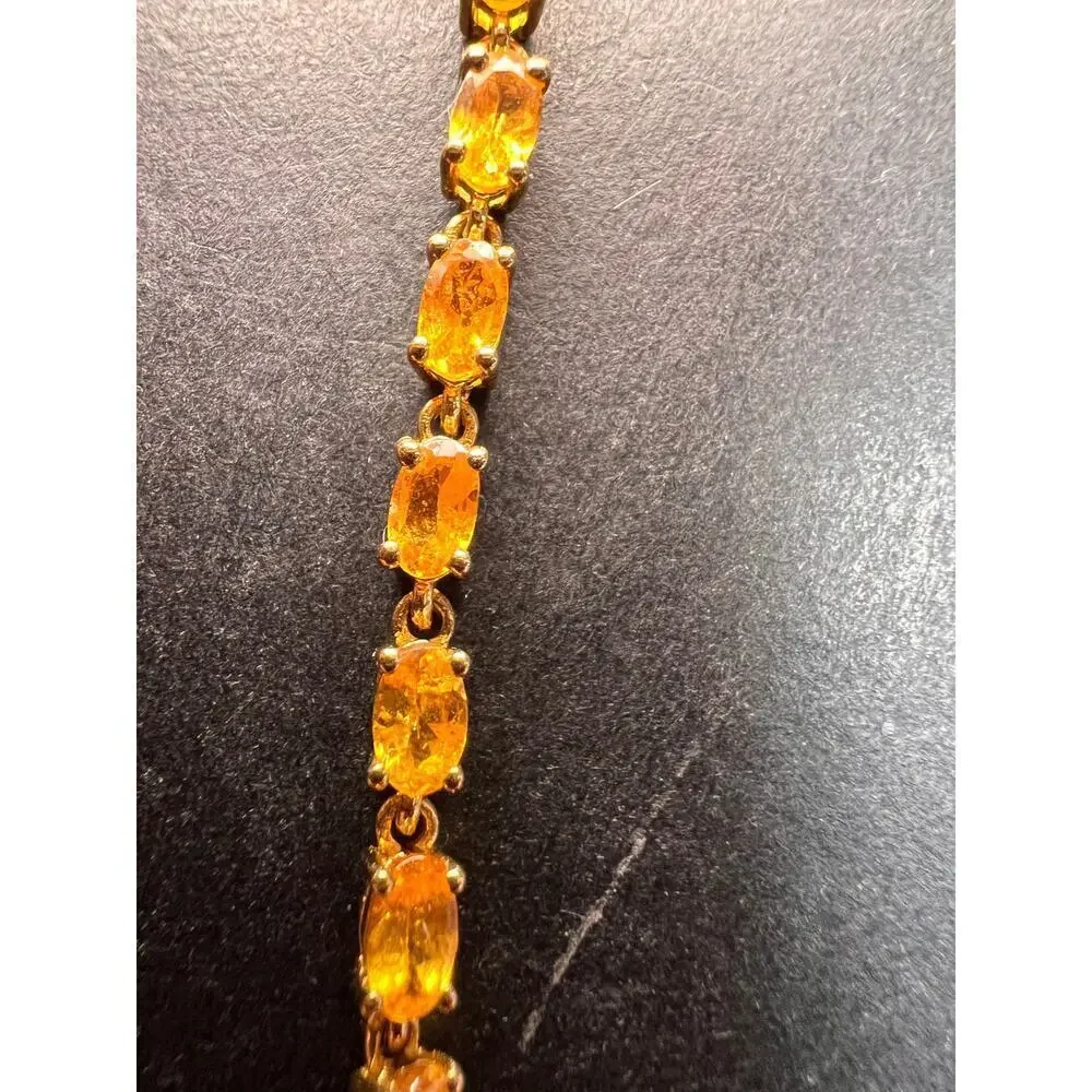 Yellow spessartine garnet tennis bracelet in gold over sterling silver
